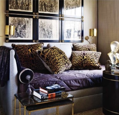 leopard pillows and quilted sofa