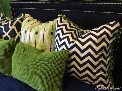 green-blue pillows on bed