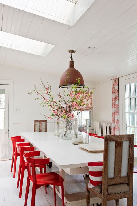 Red chairs in dining room
