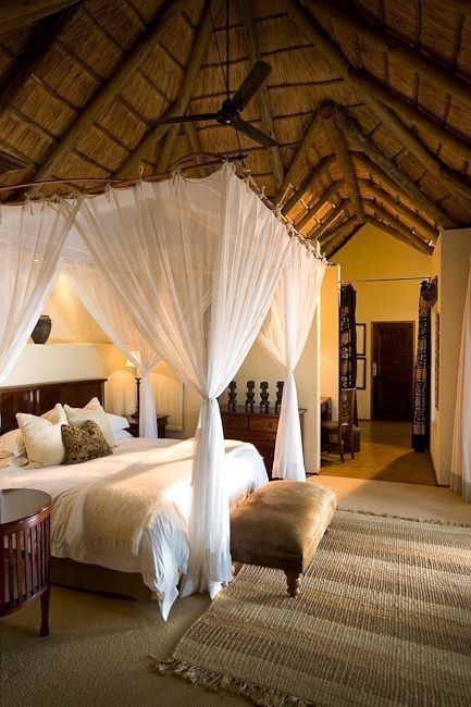 Safari chic bedroom - canopy bed